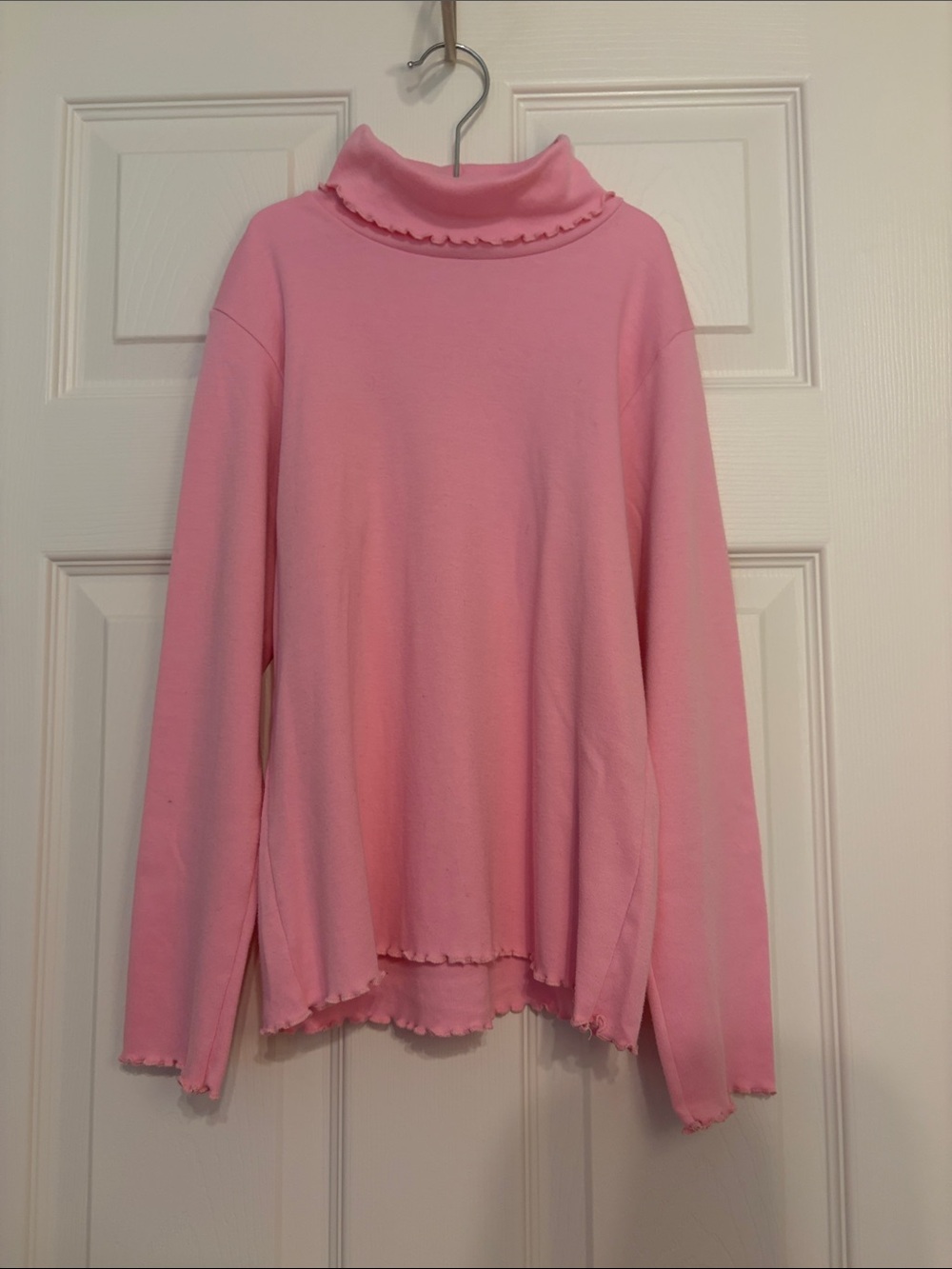 Kelly’s Kids pink turtleneck with ruffled hemming - Size L (10-12)
